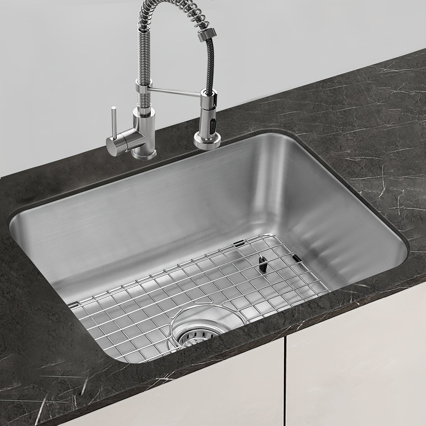 A Kitchen Sink For RVs That Is Mounted Under The Counter. Also Includes A Protector Grid And Measures 23 Inches In Length, 18 Inches In Width, And 9 Inches In Depth.